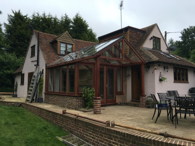 Hardwood conservatory and integrated porch